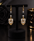 Boucles d’oreilles hibou doré, obsidienne noire et perles de verre